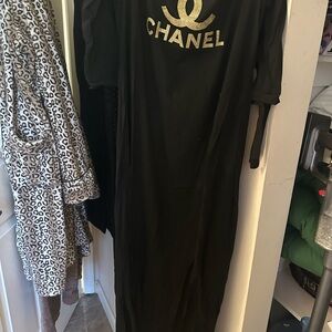 CHANEL Black Dress with Gold Logo Accent